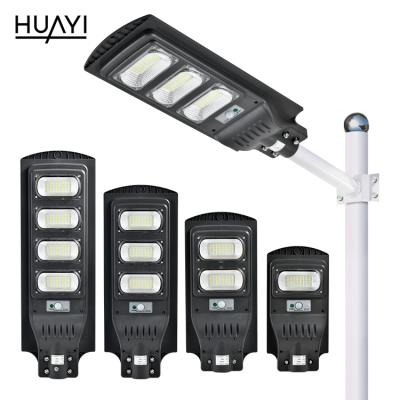 China HUAYI Style Modern High Lumen Motion Sensor Ip65 30w 60w 90w 120w Waterproof Outdoor Solar LED Street Light for sale