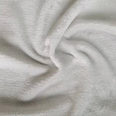 China Hot Selling 100% Polyester Plain Dyed Stretch Solid Warm White Flannel Coral Fleece Fabric For Women Coat Garment for sale