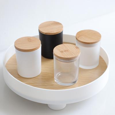 China Home Decoration 8oz/250ml Clear Frosted Black Glass Food Storage Can Place Airtight Food Candle Jars With Bamboo Wooden Lids for sale