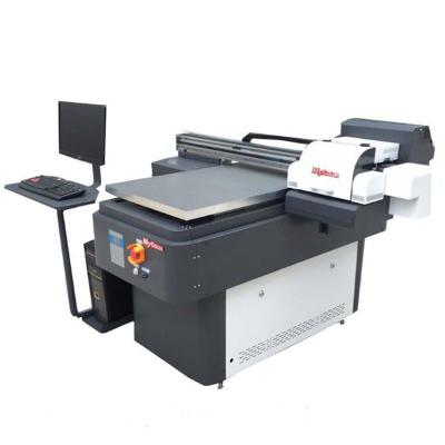 China 2018 New Design Digital Flatbed UV Printer a1 6090 uv flatbed printer with two TX800 print head uv led printer for sale