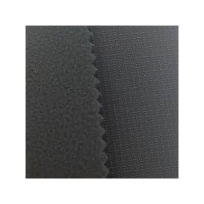 China Waterproof 2023 year stretchfabric ripstop cationic checker with tpu combined 75D fleece fabric for sale