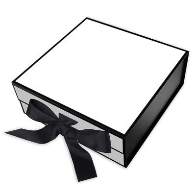 China Handmade High Quality Custom Logo Black Rigid Paper Cardboard Hair Gift Packaging Boxes With Ribbon for sale