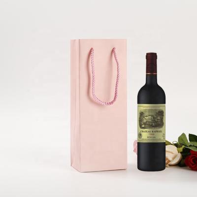 China Recyclable Paper Handle Tote Bag Drawstring Factory Price Rose Packaging Paper Garment Jewelry Gift Wine Recyclable Bottle Packaging for sale