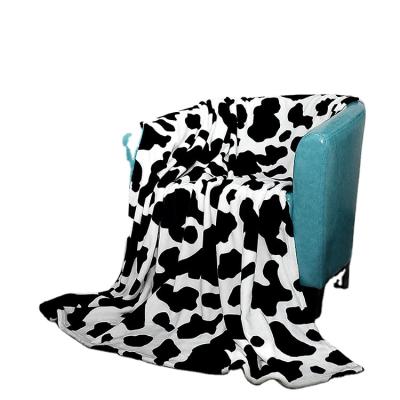 China Eco-friendly New Models Cow Polyester Super Smooth High Quality Flannel Fleece Throw Blanket for sale