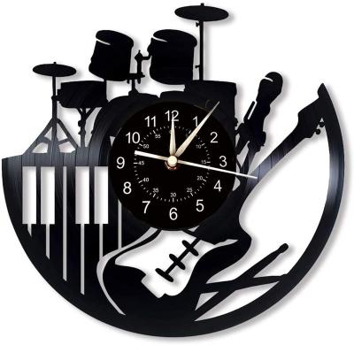 China Outlet Unique Antique Christmas Factory Style Halloween Gift Music Decoration Guitar CD Wall Clock for sale