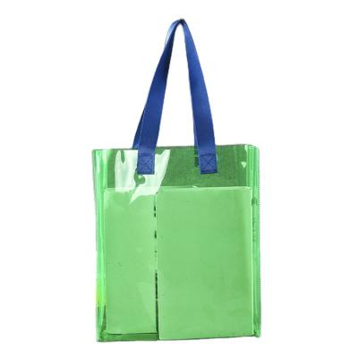 China Large PVC Fashion Tote Bag Clear Beach Bag Handled Plastic Shopping Bag For Travel for sale