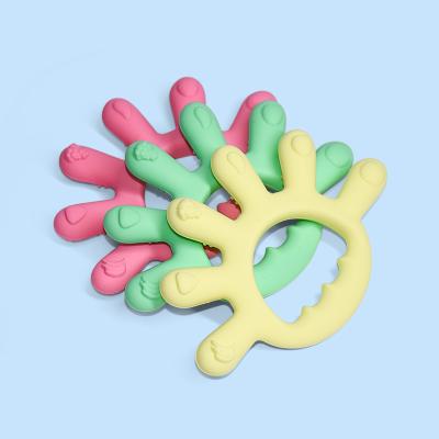 China Custom Silicone Baby Teether Toy Sensory Baby Rattle Teethring Ring Eco-Friendly Legenday New Design for sale