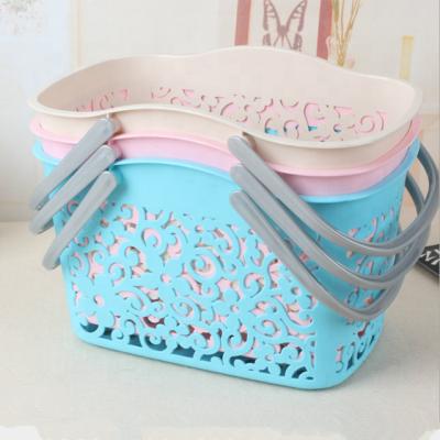 China Sustainable Hollow Flower Shape Plastic Lidless Wastebasket Flower Storage Baskets With Handle for sale