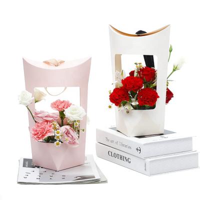 China 2021 Recycled materials china box manufacturers fashion flower paper bags for flowers packaging bags with window for sale