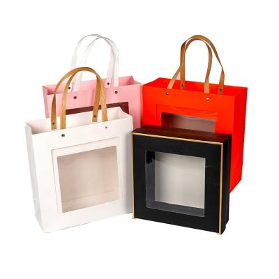 China Euro Recyclable Customized Printed Kraft Paper Gift Bags With Window Candy Boutique Luxury Shopping Tote Bags for sale