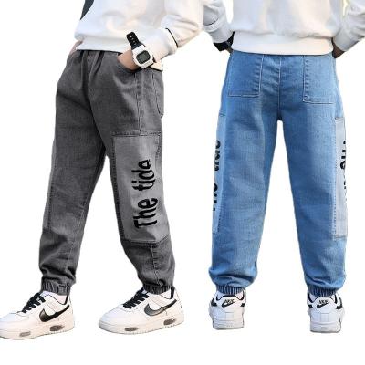 China Foreign trade children's stock anti-pilling pants large number of children's jeans spots boys and girls cartoon casual jeans for sale