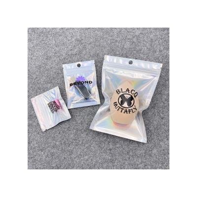 China Recyclable Rainbow Color Resealable Bright Outdoor Packaging Zip Lock Silver Aluminum Foil Plastic Holographic Zipper Laser Bags for sale