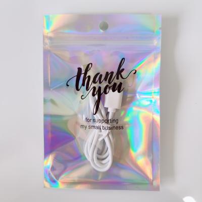 China Recyclable Custom Printed Foil Pouch Plastic Holographic Makeup Packaging Ziplock Mylar Laser Bag for sale