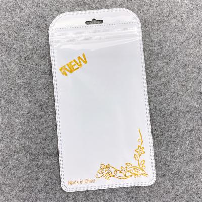 China Recyclable Custom Label Printed Cell Phone Clear Pearl Film Packaging Bag / Cell Phone Accessories Plastic Bag for sale