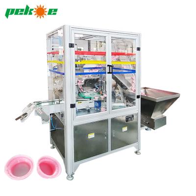 China Plastic Food Cap Lining Machine Caps Foil Inserting Wadding Equipment Liner Machine for sale