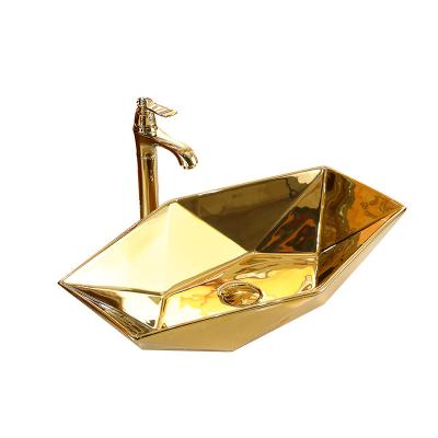 China Modern Gold Luxury Gold Countertop Bathroom Vessel Sink Porcelain Wash Basin Ceramic Hand Basin for sale