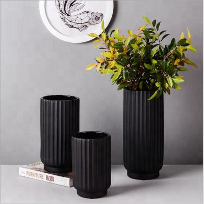 China Modern minimalist ceramic vase black wide mouth flowers flower water culture flower Nordic style home decoration jewelry for sale