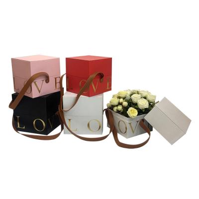 China Recyclable Simple Leather Two Flower Gift Box Hand Gift Box Portable Square Set for sale