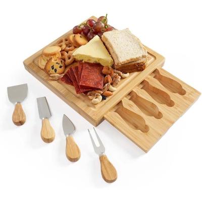 China JSY Custom Queso Tabla Cheese Boards Bamboo Cheese Board Eco-Friendly Sustainable Cheese Board Set With Wooden Bamboo Handle for sale