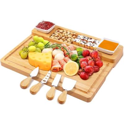 China JSY New Design Charcuterie Board Viable Custom Queso Board Bamboo Cheese Board Tablas De Queso Tablas Cheese Dish with Knife and Handle for sale