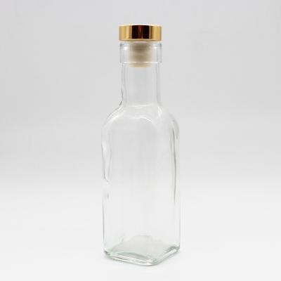 China Hot Sale Square 180ml Beverage Small Vodka Whiskey Brandy Wine Glass Bottle With Cork for sale