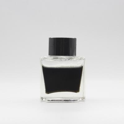 China Wholesale High Quality Recyclable Square Shaped 50ml Empty Glass Ink Bottle With Cap Black Fountain Pen Ink Bottle for sale