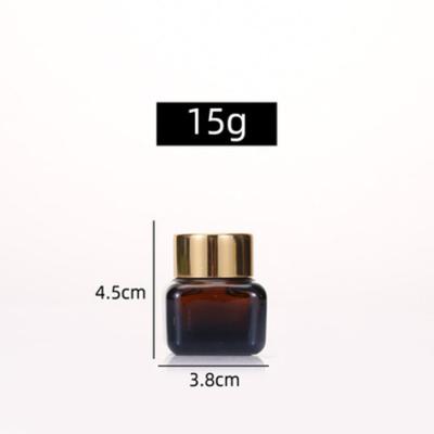 China Hot Selling Cosmetic Skin Care Essential Oil 15ml Amber Square Glass Bottle With Lid 20g Luxury Face Cream Glass Bottle for sale