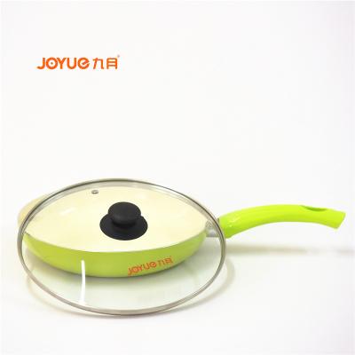 China Sustainable Cast Iron Cookware Stainless Steel Rim Tempered Glass Lid for sale