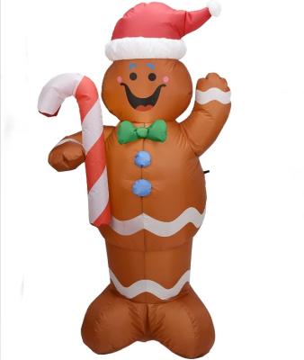 China Oxford cloth ready to ship sale price 5ft inflatable gingerbread man with candy canes for party or yard decoration for sale