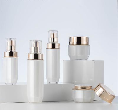 China New Style Design Cosmetic Luxury Acrylic Bottle Set Skin Care Container Manufacturer With Spray Pump for sale