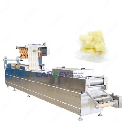 China Automatic Food Stretch Film Fruit And Vegetable Vacuum Packing Machine for sale