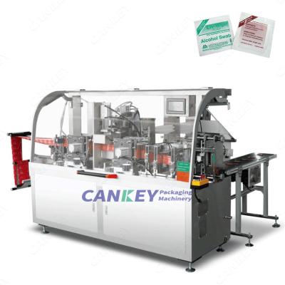 China Single Food Cankey Seal 4 Automatic Side Flow Wet Tissue Packing Machine for sale