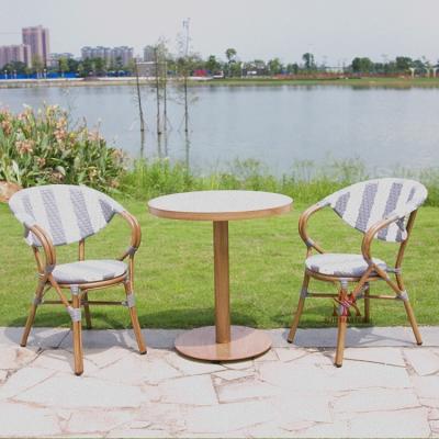 China Modern Single Outdoor Garden Furniture Rattan Chair And Coffee Table Set High Quality Rattan Wicker Stackable Bistro Chair By Hand Made for sale