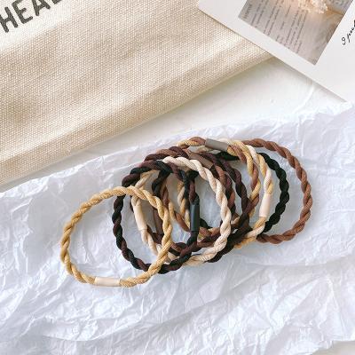 China Korean Hair Tie Style Bracelet Hair Tie Twisted Elastic Ponytail Holders Shades Of Beige And Brown Colors for sale