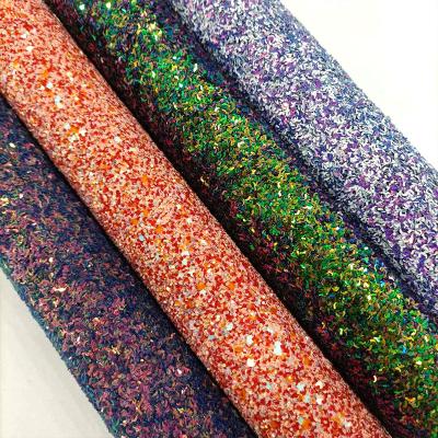 China Holographic Shiny Effect Abrasion-Resistant Chunky Glitter Synthetic Leather Roll Multicolor /Sheet For Making Shoe Upholstery/DIY Accessories for sale