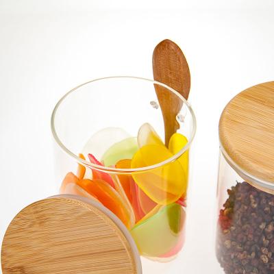 China Sustainable Airtight Kitchen Glass Storage Jars With Bamboo Lid And Spoon Set Of 2 for sale