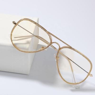 China Retro high-grade metal diamond frame vintage round thin sun glass women for sale