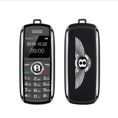 China MP3 Playback Mini Mobile Phone V8 Super Magic Voice Push Button Dual SIM Cards Dialer 1.0