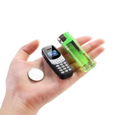 China Small Size Magic Dialer Phone Mini Phone FM Mobile Phone FM Mini Phone FM Audio Playback MP3 Voice Cell Phone for sale