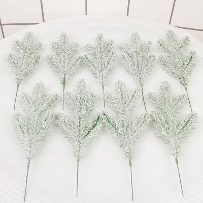 China Plastic Simulation Pine Needles With Snow Sprinkles Artificial Greenish Branch Christmas Tree Accessories Plant Home Decoration Supply 5Forks for sale