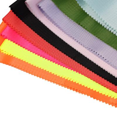 China 100% Polyester Waterproof 210D 0.4 Grid PVC Coated Oxford Fabric For Bag Clothes zu verkaufen