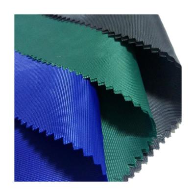 中国 100%polyester shu mei silk twill taffeta fabric for shirt dress lining down jacket 販売のため