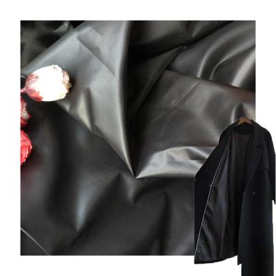 中国 Cire finish 190T 210T poly taffeta waterproof printed jacket coat man suit lining fabric 販売のため