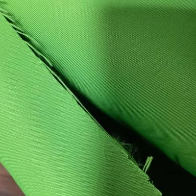 China 100% Polyester 300D gabardine 2/2 twill neon green for uniform suitcase and handbag cloth fabric for sale