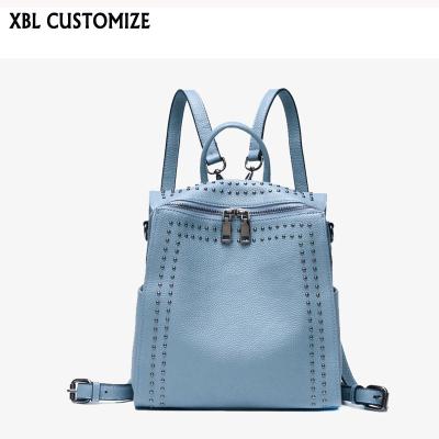 China Fashion Genuine Leather Women Rivet Backpack Zippers Customized Rivets Ride Blue for sale