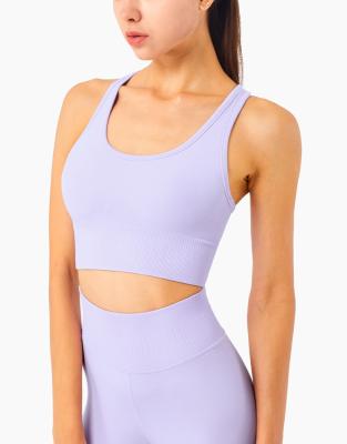 China 2021 New Solid Color O-Neck Navel Vest Tank Top Sports Bra Seamless Workout Fitness QUICK DRY Running Shirts For Women for sale