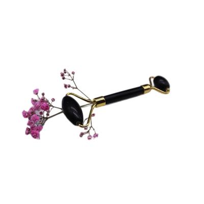 China Crystal Middle Handle Rose Quartz Facial Jade Roller Massager Facial Whitening for sale