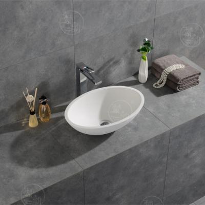 China FW-2223 Modern Artificial Stone Oval Bathroom Sink Countertops Wash Basin for sale