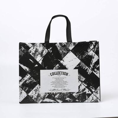 中国 Eco friendly foldable non-woven fabric customized size color white black retail shopping bags with logo print 販売のため