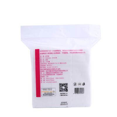 China Disposable Square 5x6cm Cosmetic Cotton Pads for sale